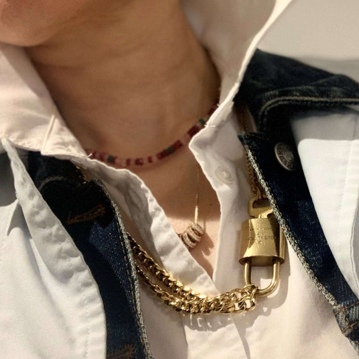 Ona Chan jewelry Vintage LV lock and key wet layering with Hayley Necklace, Khai Necklace and Cuban Chain necklace with vintage lock
