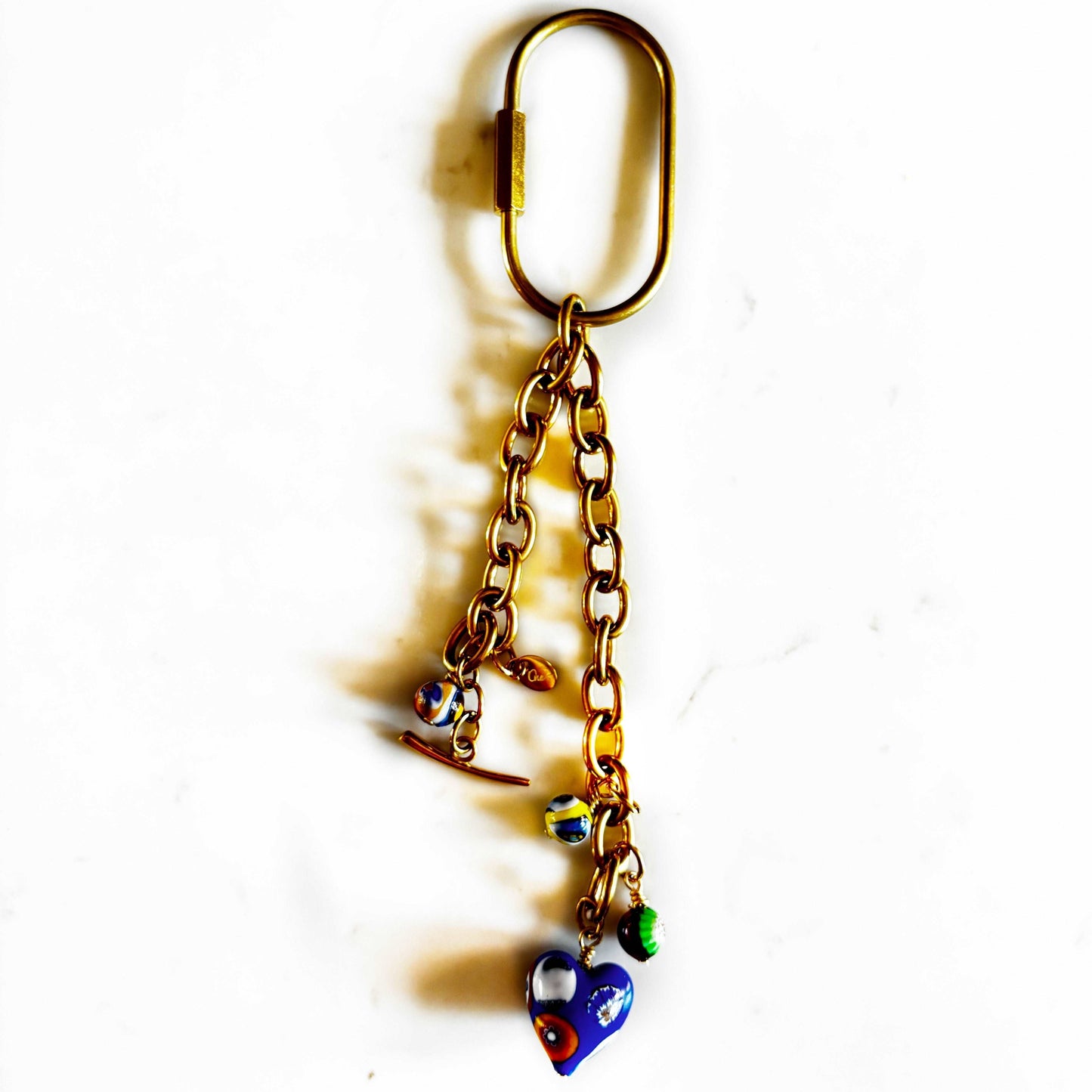 Ona Chan Jewelry convertible Sofia bag charm bracelet keychain with vintage millefiori bead - blue with oval ring