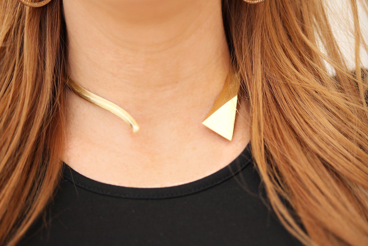 Hilary Kennedy in black dress wearing Mantra Large Dagger Collar - Necklace