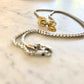 Khai Necklace - Steel box chain with 925 Silver Rings Vermeil plated in 18K gold on marble table