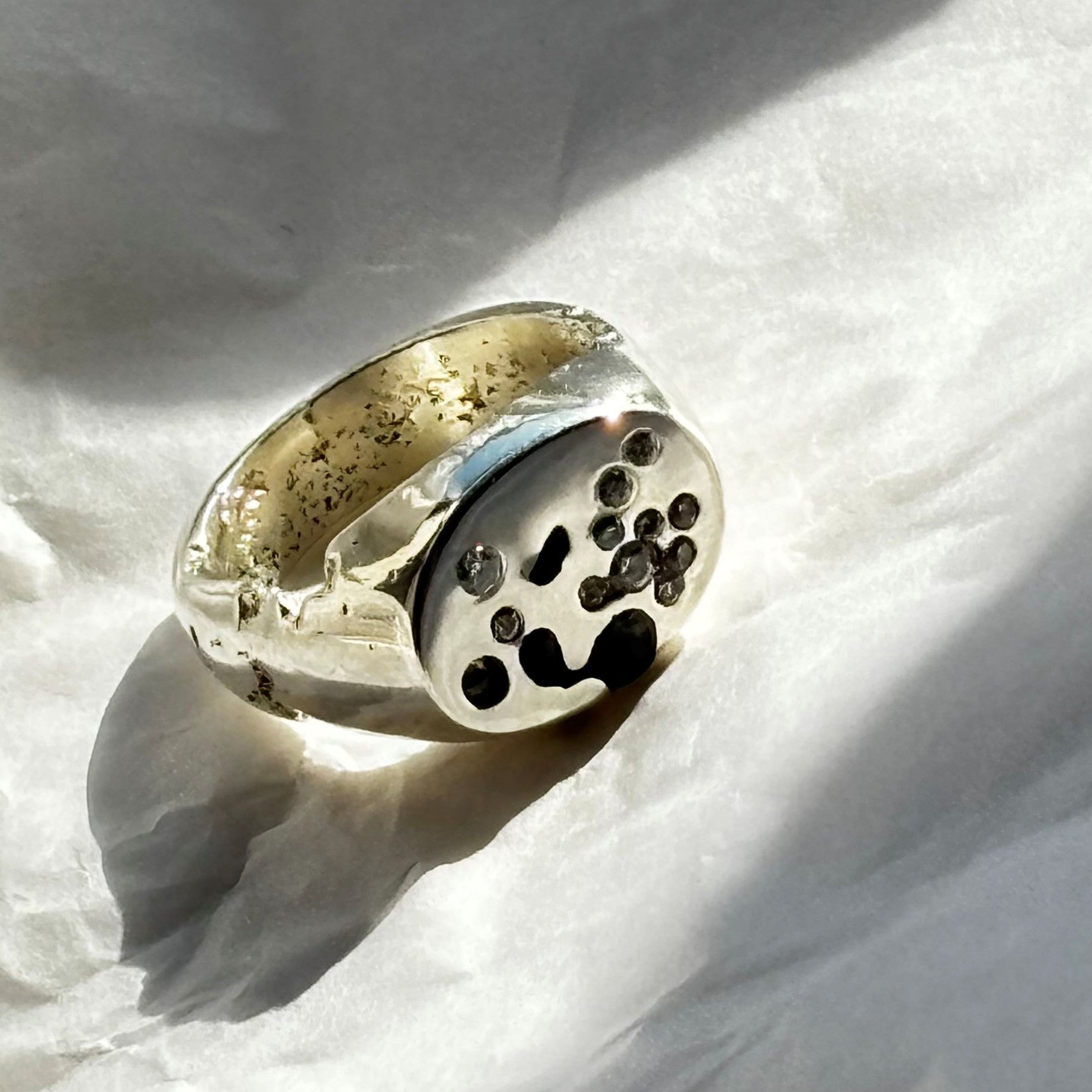 Joni ring on side with vintage and lab sapphires showing back