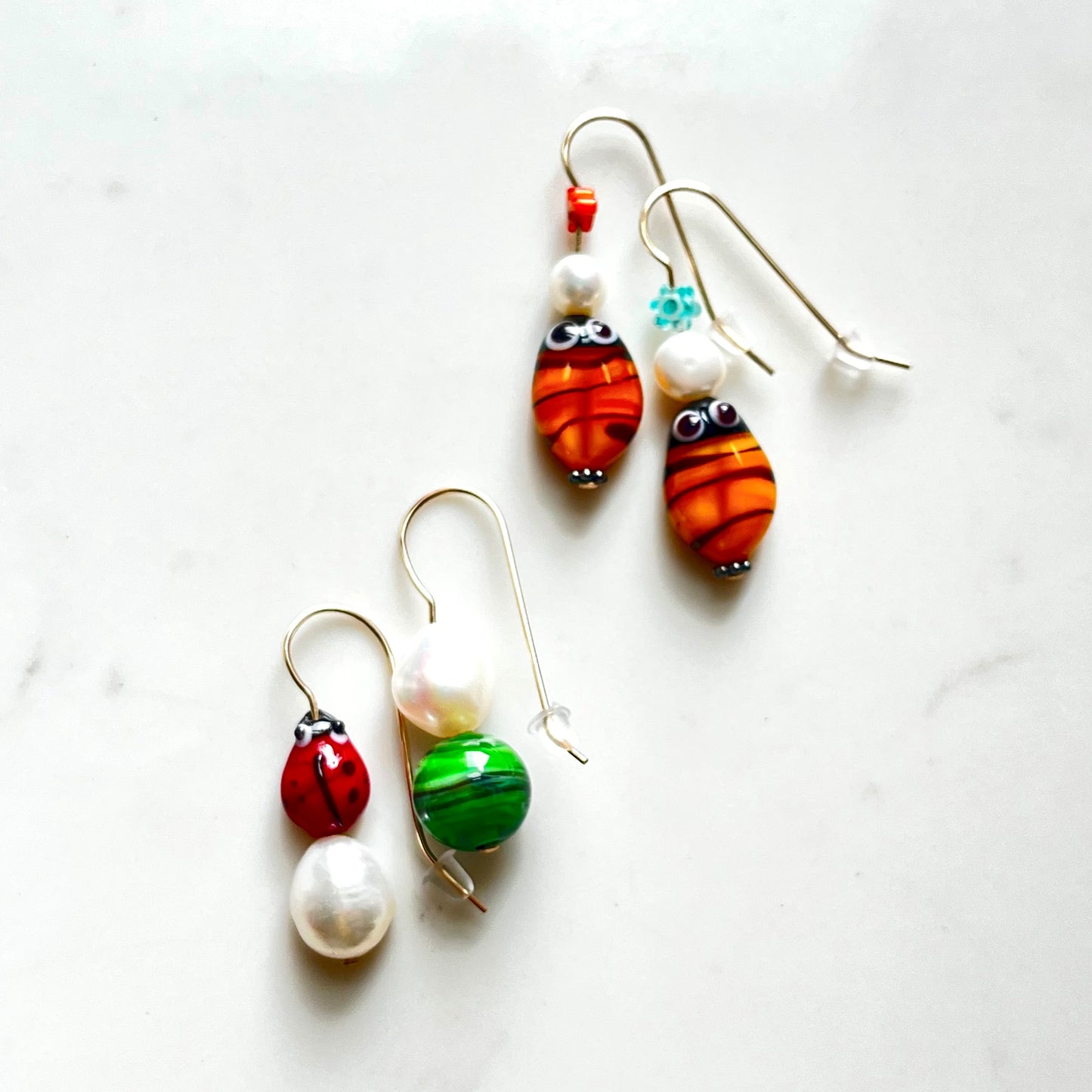 Bee and ladybug earrings, murano glass beads with baroque white pearls and millefiori beads