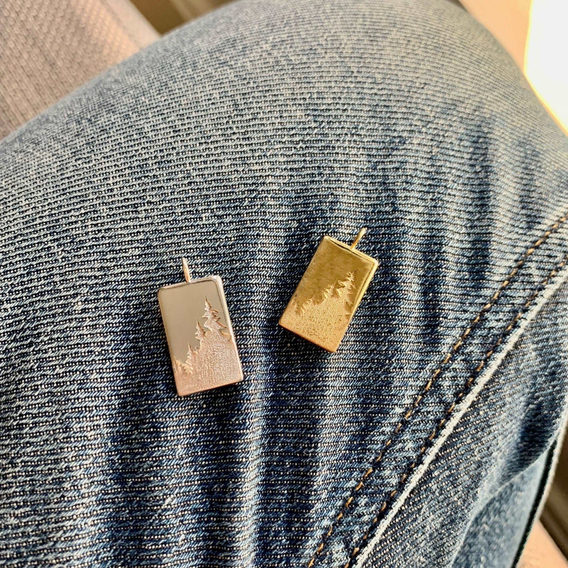 Rochelle Revelstoke Pendants Silver with Gold and Rhodium Plate on jeans