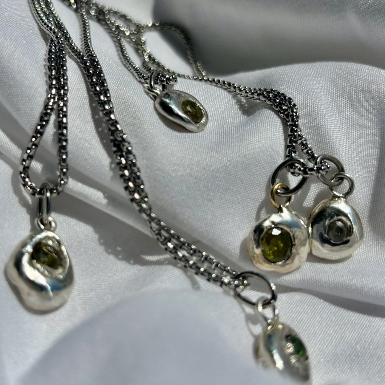 multiple recycled OCJ nuggests with lab sapphires with steel box chain