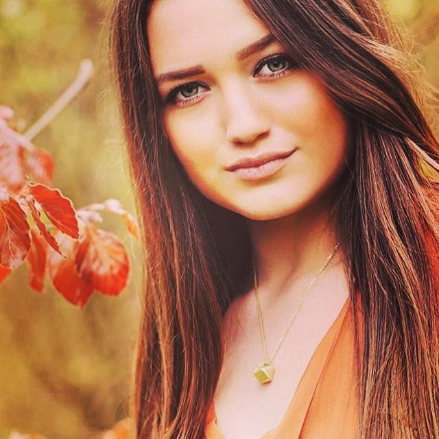 brunette with light eyes wears Mantra Cube Necklace
