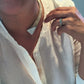 woman in white wearing linen shirt Mantra Large Dagger Collar - Necklace