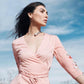 Blogger Tienlyn of Thoughtful Misfit Mantra wearing blush wrap dress wearing Large Dagger Collar Necklace