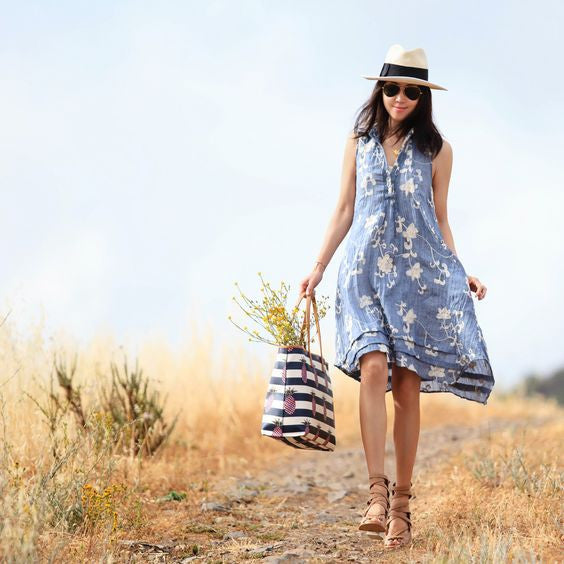 Blogger Jane Song of FitFabFun Mom in blue sun dress with straw hat wearing Mantra Six Dagger Necklace - rhodium
