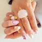 woman with pink mani with stones and Lattice Round Cocktail Ring With Natural Stones