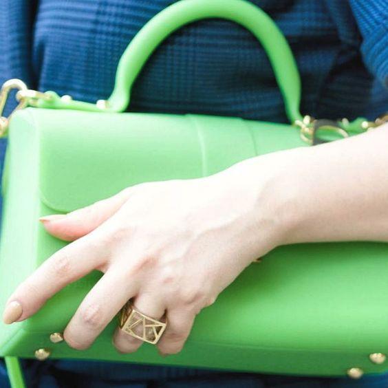 Blogger Veronica of Bittersweet Colours Ring wearing blue dress holding green bag with Lattice Square Cocktail Ring